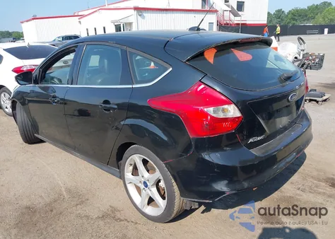 2014 Ford Focus Titanium z USA, uszkodzony, nr VIN 1FADP3N26EL458386